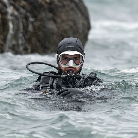 man wearing apeks evx200 regulator set